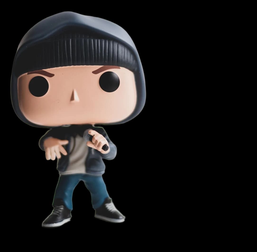 A vinyl collectible figure cut out with a cast shadow